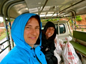 Julie and I in the back of our truck… on our way to the Bokeo Nature Reserve after a rainy morning. 